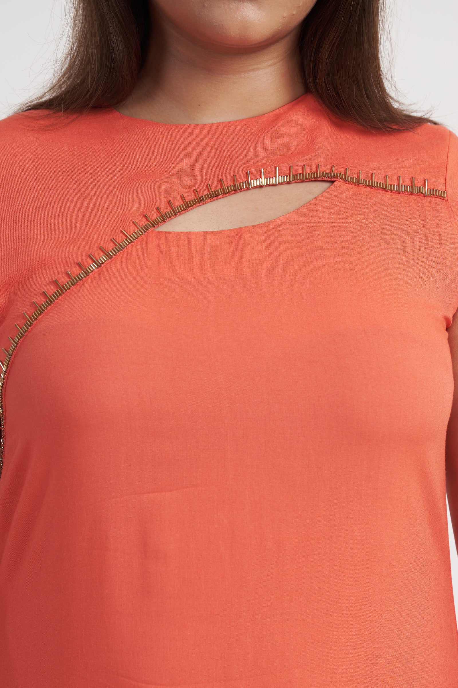 Beaded asymmetric cut-out neckline detail on Corel Pink maxi dress