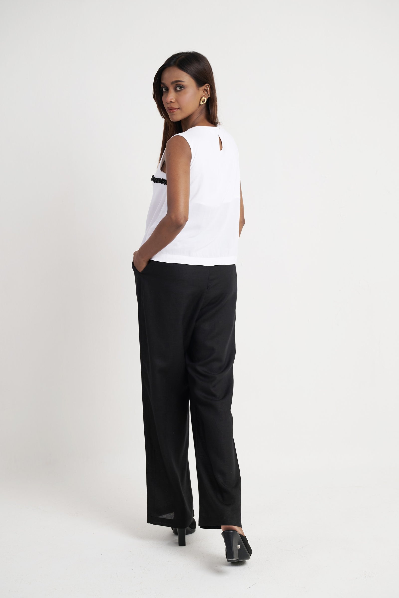 Beaded embroidered sleeveless top for women in bright white back view