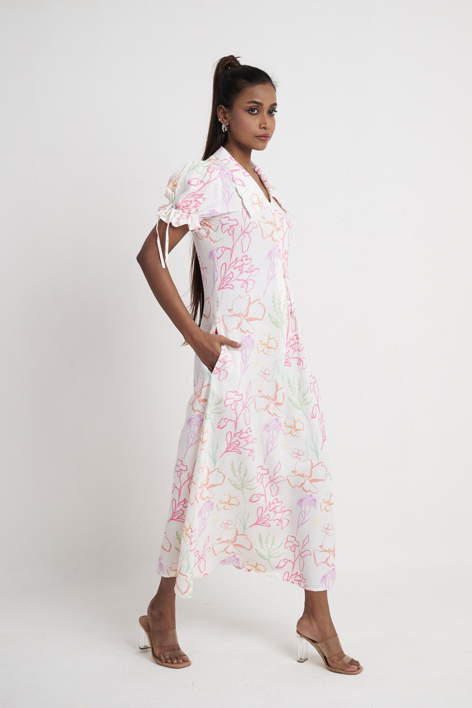 Zykaz Flora Pleat Midi Dress in bright white floral print — side view with pocket