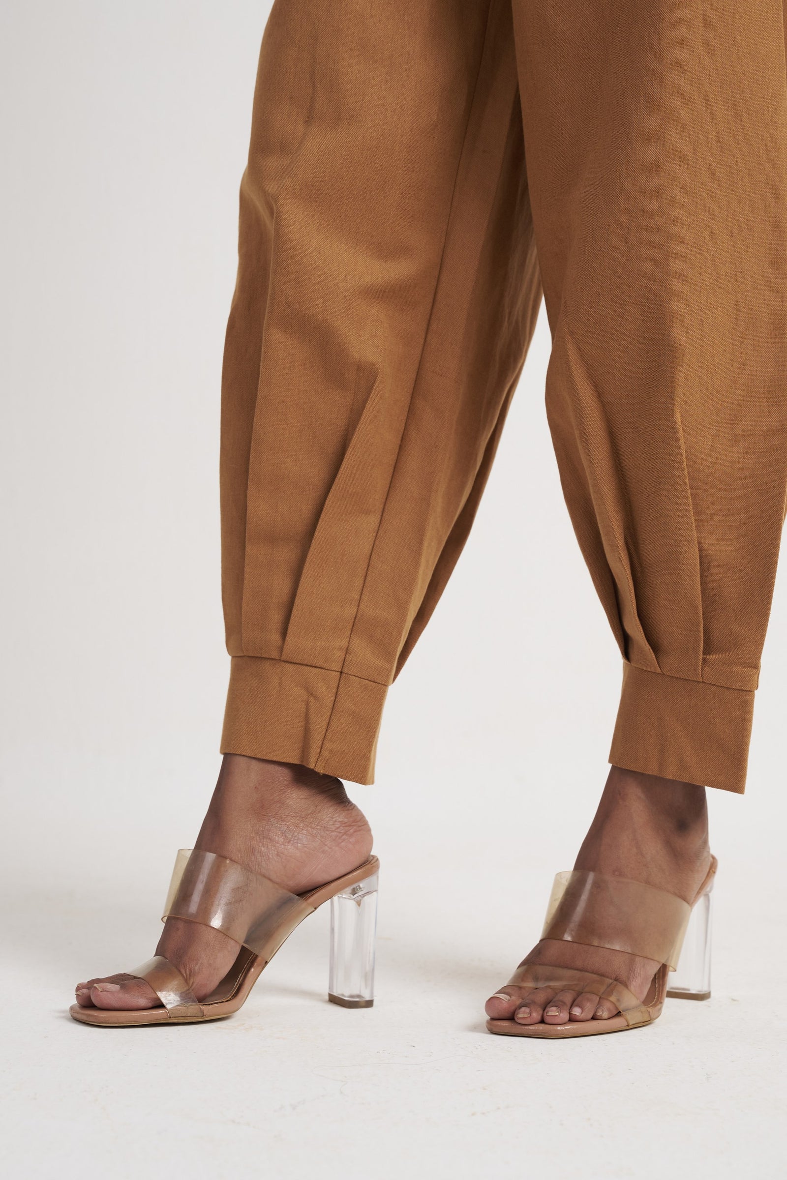 Zykaz High-Rise Pleated Tapered Trouser in Chipmunk — turned-up cuff detail