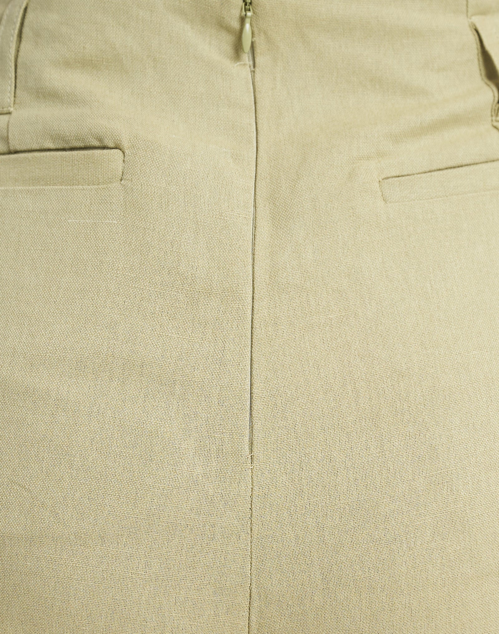Seamless side construction detail on sage green trouser