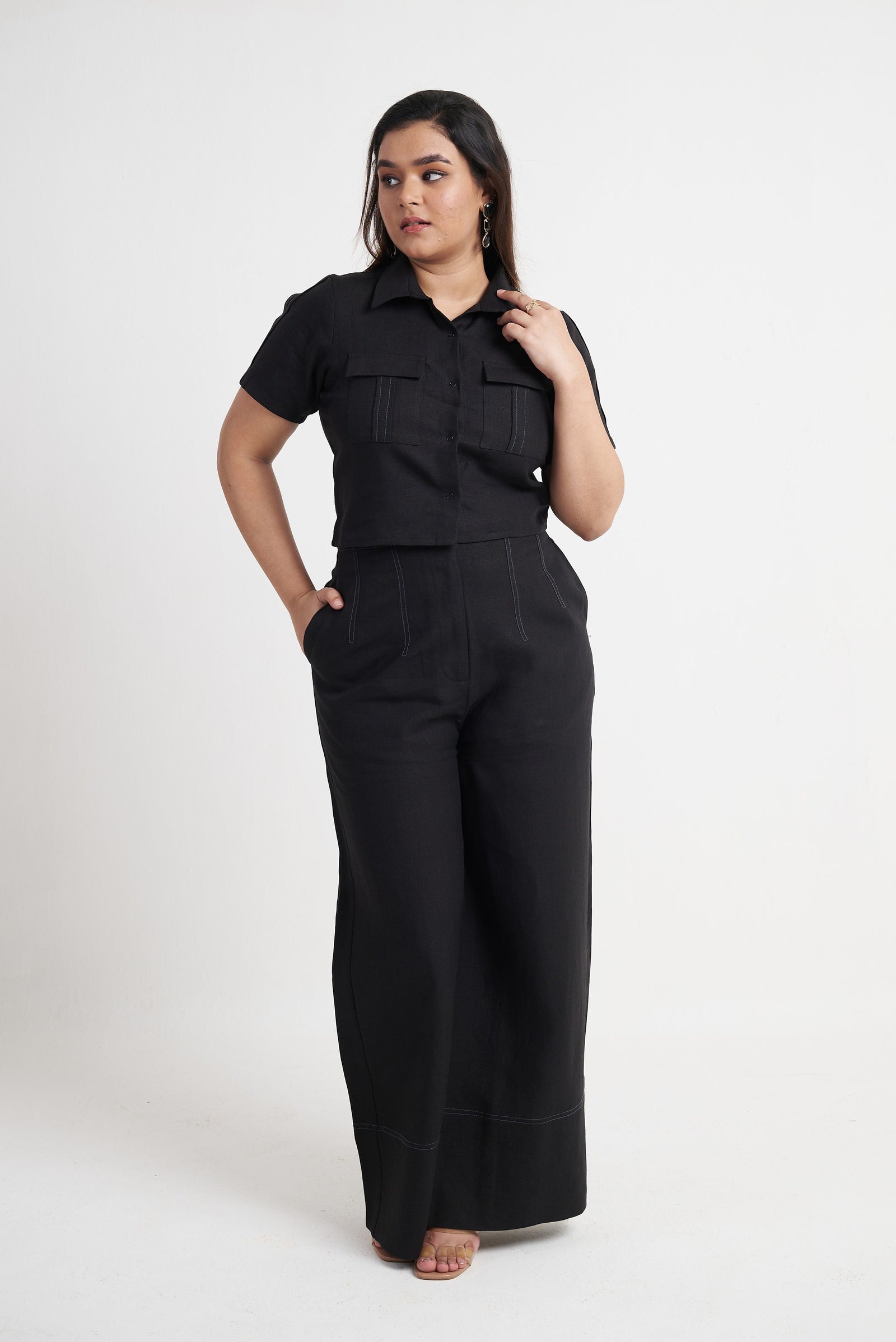Short sleeve utility crop shirt for women in black styled with wide leg trousers
